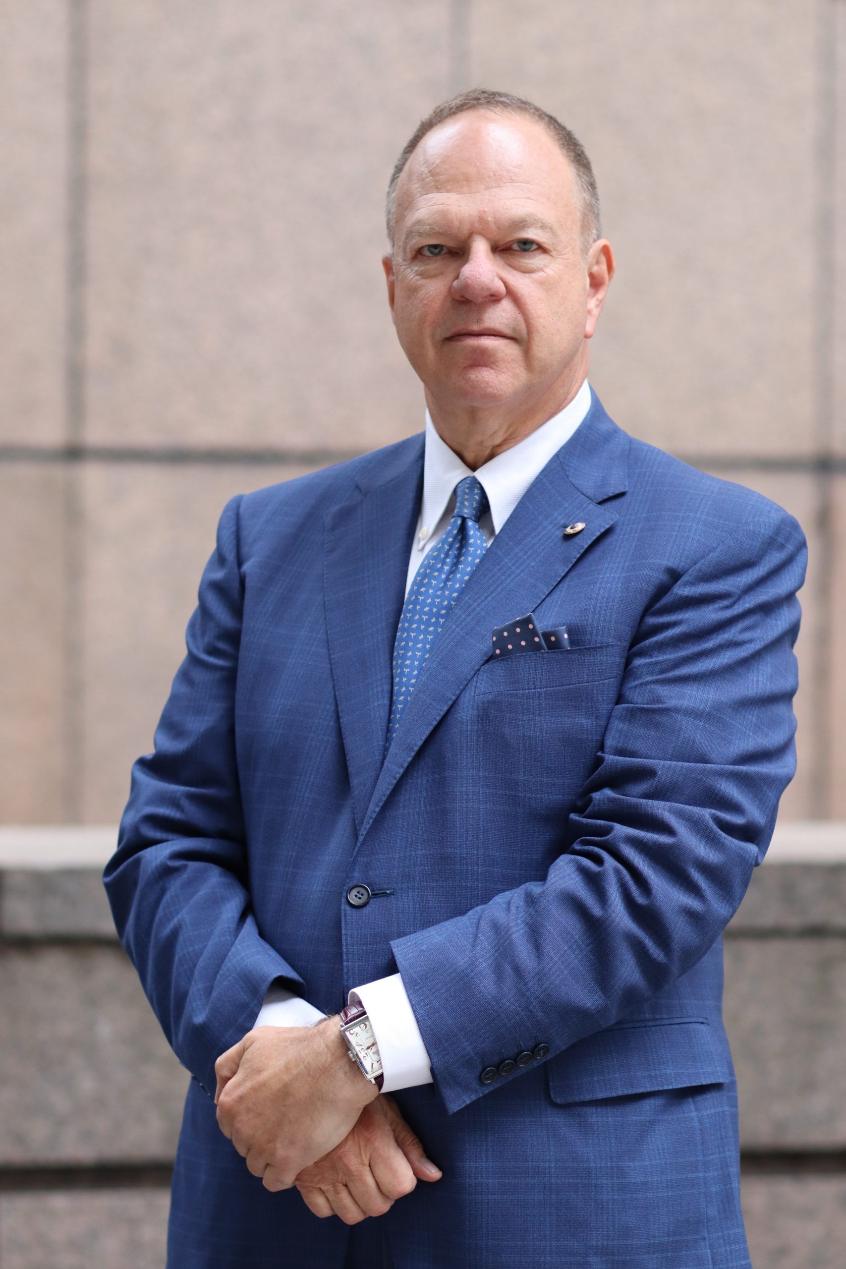 A headshot of David A Kaminsky.