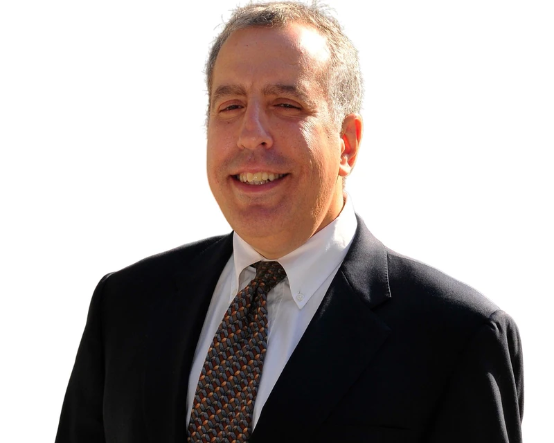 Professional headshot of Ron-Kaplan, Of Counsel at David A. Kaminsky & Associates